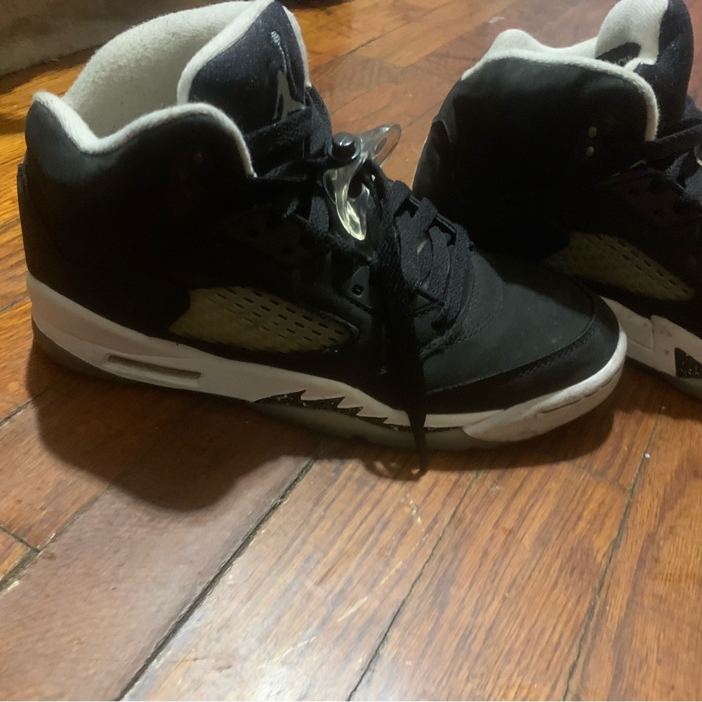 Jordan 5s . Worn , still decent . Size 5/5